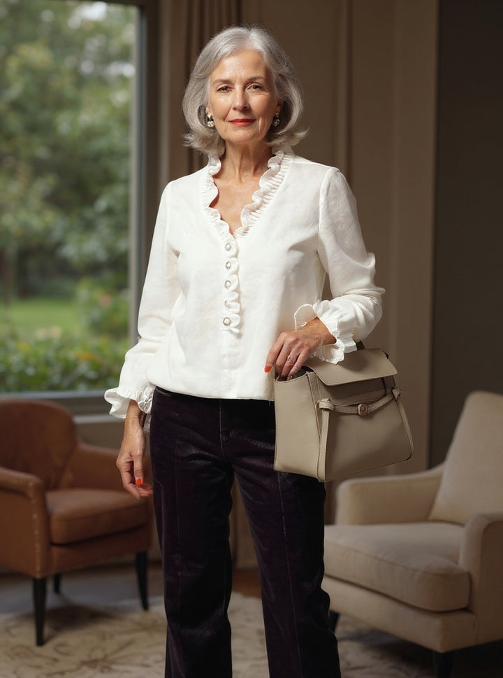 LIORA™ | Knotted blouse with ruffles