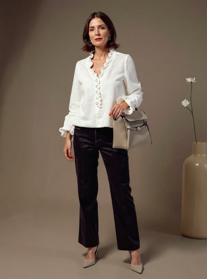 LIORA™ | Knotted blouse with ruffles