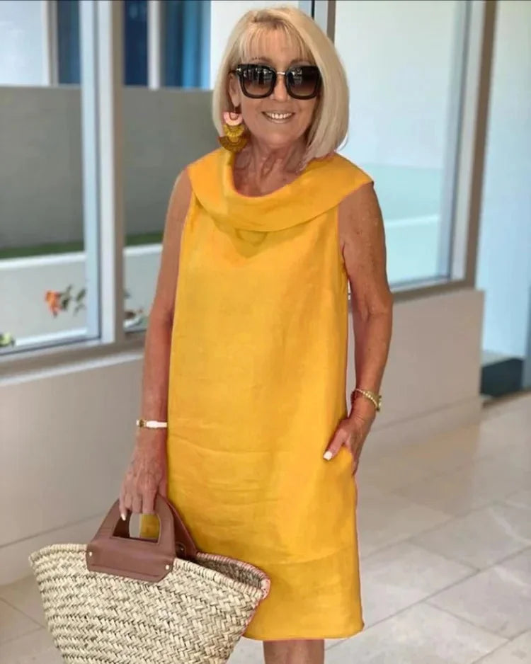 NALANI | SLEEVELESS SHIFT DRESS WITH ROUND NECKLINE - La femme Toronto